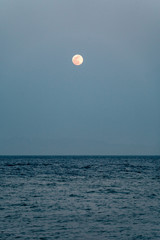 red moon on the sea