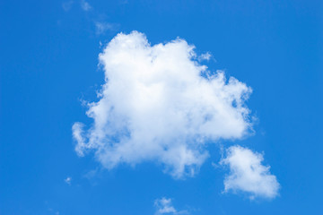 Naklejka na ściany i meble White clouds look soft on a beautiful blue sky background.