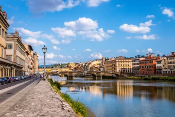 Photo sur Plexiglas Ponte Vecchio The Ponte Vecchio over the Arno river in Florence, Tuscany, Italy