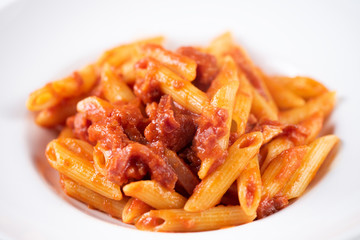 Italian Amatriciana Pasta with tomato sauce and smoked bacon