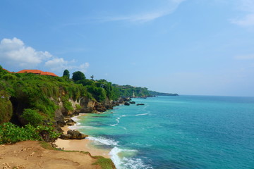 Fototapeta na wymiar Beautiful view of stone coast at Bali island, Tegal Wangi Beach, Bali, Indonesia