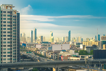 Naklejka premium Blue sky and cloud with city downtown view in bangkok Thailand-image