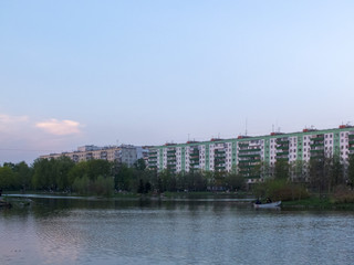 City park with a pond with an island