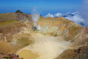 Active volcano Mount Egon with a caldera and sulfuric gasses coming from within the volcano on East Nusa Tenggara, Flores, Indonesia