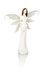 Small plaster angel. Isolated on white background with shadow reflection. Symbol of Easter.