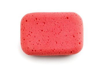 Red sponge isolated on white background. Top view