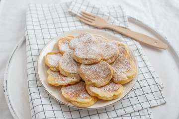 home made sweet vanilla Tasty Pancakes with sugar on a table