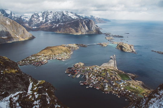 Scenic landscape of Lofoten islands: peaks, lakes, and houses. Reine village, rorbu, reinbringen