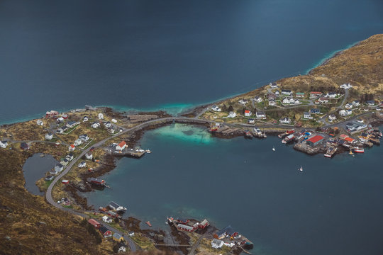 Scenic landscape of Lofoten islands: peaks, lakes, and houses. Reine village, rorbu, reinbringen