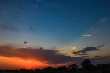 Sunset / sunrise with clouds, Panoramic view of a cloudy sky at sunset 