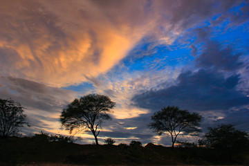 Fototapeta na wymiar Sunset / sunrise with clouds, Panoramic view of a cloudy sky at sunset 