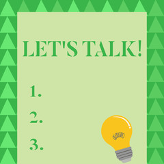 Conceptual hand writing showing Let S Talk. Concept meaning they are suggesting beginning conversation on specific topic Light Bulb with Filament Inside Resting on Blank Color Paper