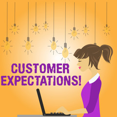 Writing note showing Customer Expectations. Business concept for Perceivedvalue clients seek from the buying of a good photo of Young Busy Woman Sitting Side View and Working on her Laptop