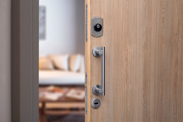 Open door of a family home. Close-up of the lock in an armored door in a department.