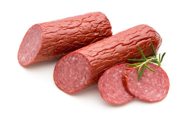 Salami smoked sausage, basil leaves on white background cutout.