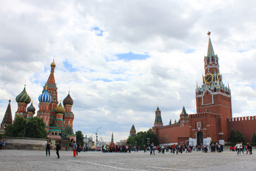 Kremlin Spasskaya Tower and Cathedral of St. Basil at the Red Square in Moscow, Russia 