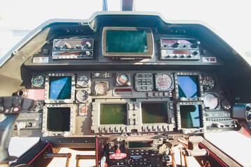 Black control panel in a helicopter cockpit.