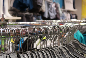 Fototapeta premium Clothes hanging in a shopping mall