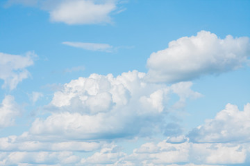 Naklejka na ściany i meble big white clouds in the blue sky