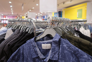 Clothes hanging in a shopping mall