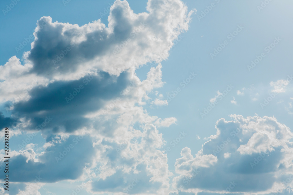 Wall mural big white clouds in the blue sky