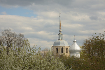 view of Velikiye Luki, Russia, cathedral against cloudy sky - obrazy, fototapety, plakaty