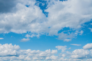 Obraz na płótnie Canvas big white clouds in the blue sky