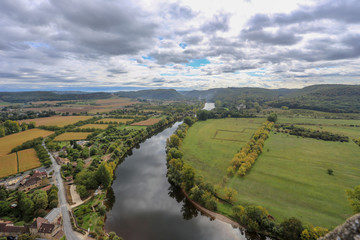 Fototapeta na wymiar Top view of the Dordogne River, fields, forests. France