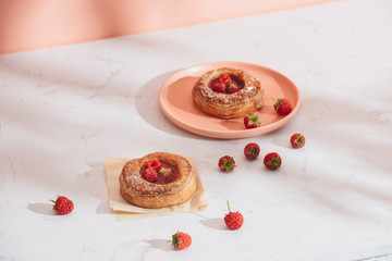 Homemade puff pastry with raspberries. Sweet tasty dessert. decorated with powdered sugar