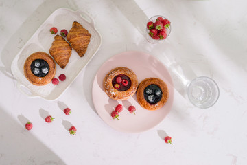 Obraz na płótnie Canvas Romantic tropical breakfast Danish pastry, coffee, juice. Summer background