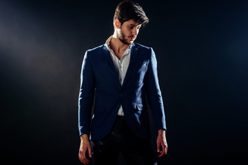 Fototapeta premium Fashion male model looking while looking away