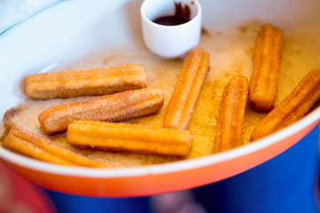 Churros with cinnamon sugar and chocolate sauce