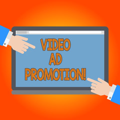 Handwriting text Video Ad Promotion. Concept meaning help drive more views and subscribers to your channel Hu analysis Hands from Both Sides Pointing on a Blank Color Tablet Screen