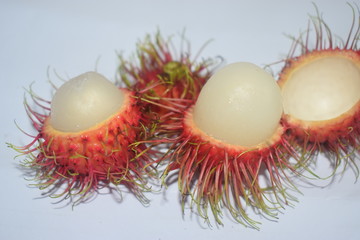 fresh red rambutans fruit inside white, sweets ,  tropical fruit in Thailand