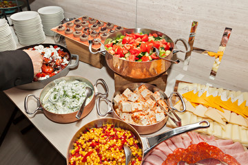 Variety of arranged party finger food - cold buffet.