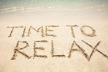 Time To Relax Text On Sand At Beach