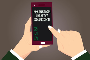Word writing text Brainstorm Creative Solutions. Business concept for intensive and freewheeling group discussion Hu analysis Hands Holding Pointing Touching Smartphone Blank Color Screen