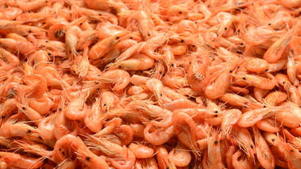 Tasty fresh shrimps as background.