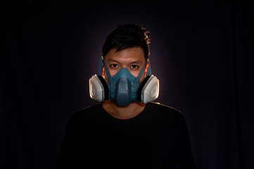 Men wear masks to prevent dust and smoke. ,black background