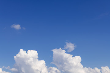 Naklejka na ściany i meble Summer blue sky with soft white clouds background