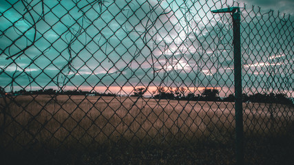 Fence with barbed wire