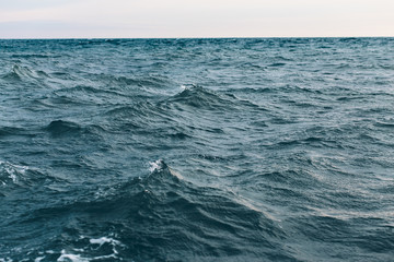 dark blue sea water background, shades of blue in black sea