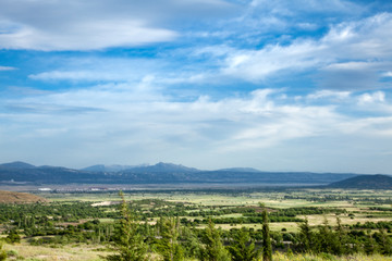beautiful landscape of cultivated fields and sky