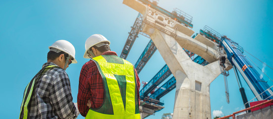 Engineer construction workers at work