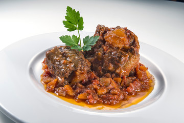 Dish with portion of oxtail stewed