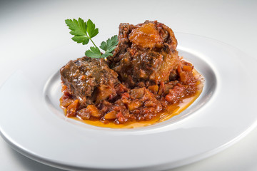 Dish with portion of oxtail stewed
