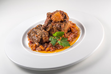 Dish with portion of oxtail stewed