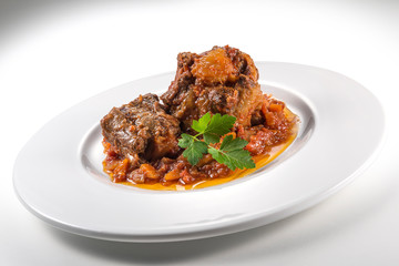 Dish with portion of oxtail stewed