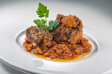 Dish with portion of oxtail stewed
