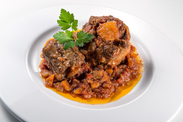 Dish with portion of oxtail stewed